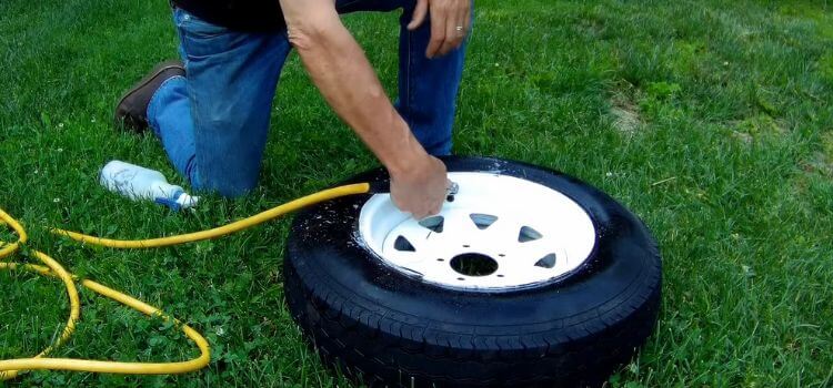 Use an air compressor to inflate the tire and seat the bead.
