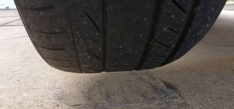 How do you avert flat spots on tires during storage