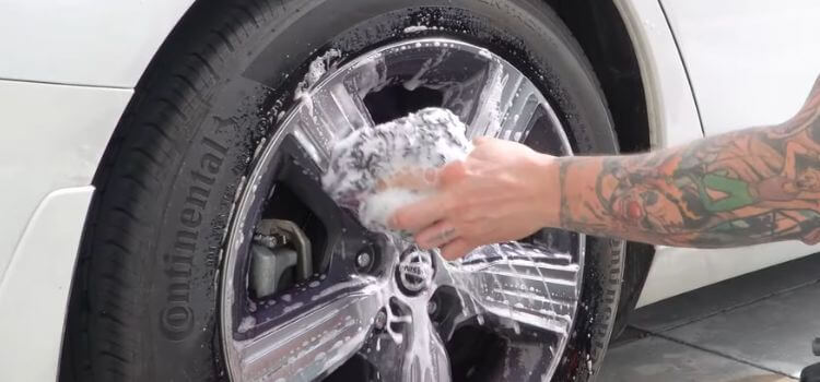 Grab a wheel brush to scrub the cleaner and remove any tough dirt or brake dust.